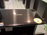 a laptop that is sitting on a table in a store