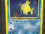 a picture of a pokemon card with a picture of a fish on it