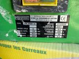 a box that has a green and yellow clock on it