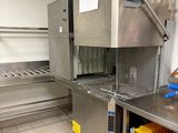 a large machine that is sitting in a kitchen
