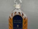 a bottle of liquor that is sitting on a table
