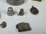 a lot of silver items that are on a table