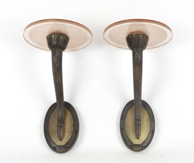 pair of antique cast iron wall sconces