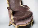 an image of a chair with a brown upholstered seat