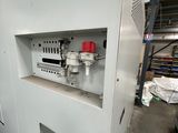an image of a machine that is in the process of being worked