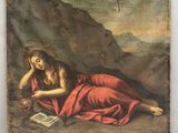 un tableau représentant une femme allongée sur un rocher, un livre à la main