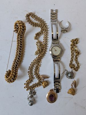a lot of jewelry on the table together