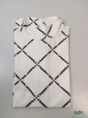a white t - shirt with black and white letters on it