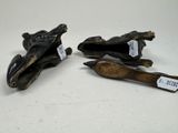 pair of bronze figurines of a dog and a cat