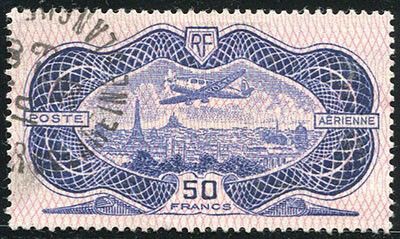 a close up of a stamp with a picture of a plane