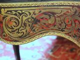 a close up of a table with a clock on top of it