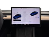 the dashboard of a car with a laptop computer on it