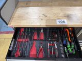 a drawer full of tools in a store with a price tag on it