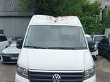 a white van that is parked in a parking lot
