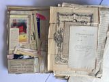 several old books are stacked on top of each other on a table