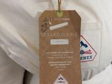 a label on the back of a man ' s shirt