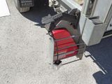 a close up of a forklift on the side of a truck