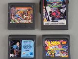 three nintendo games are sitting next to each other on a table