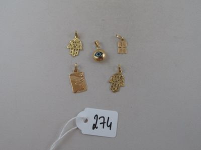 a tag with a tag that says h e on it next to some charms