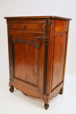 an old wooden cabinet with a drawer on one side and a drawer on the other side