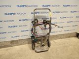une image représentant un chariot équipé d'une pompe