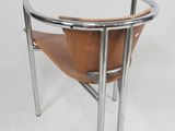 an image of a wooden chair with metal legs and a leather seat