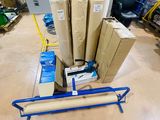 a cart with boxes and a roll of paper on top of it