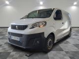 a picture of a white van parked in a garage