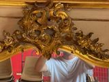 a man that is standing in front of a mirror