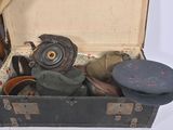 a suit case with a lot of items inside of it