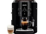 gros plan d'une machine à café avec une tasse de café