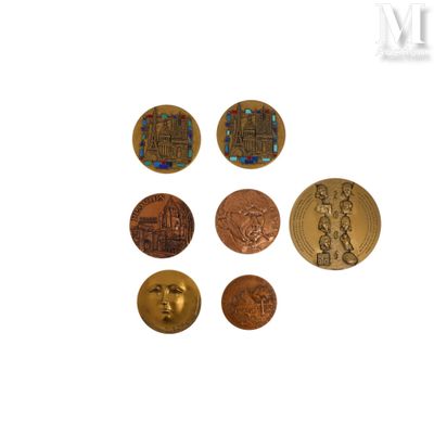 six different types of coins are shown on a white surface