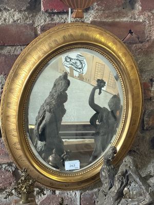 a picture of a reflection of a man and a woman in a mirror