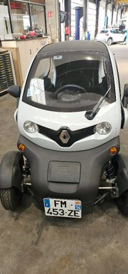 a small car that is parked in a garage
