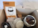 a box of coffee cups and a cup holder in it