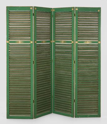 a green room divider with shutters open on a white background