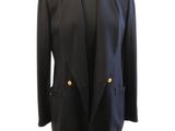 a black jacket on a mannequin stand with a white background