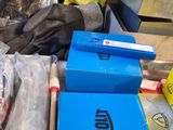 a pile of assorted items sitting on the ground