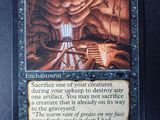 a close up of a card with a picture of a cave in the background