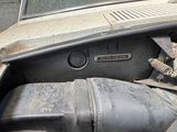 an old car that has been left in the garage