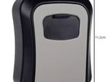 an image of a black and white paper towel dispenser