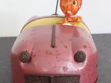 a toy car with a man sitting on top of it