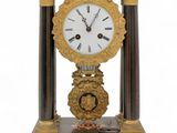 a clock that is sitting on top of a table