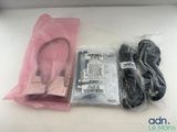 a pink bag with a cord and a charger in it