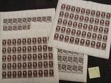 two sheets of stamps with a picture of a woman on them