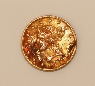 an image of a gold coin with a santa clause on it