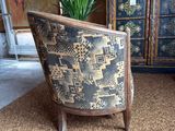 a chair that is sitting in the middle of a room