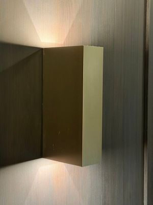 a light that is on on a wall in a room