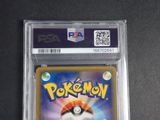 a close up of a pokemon card on a table