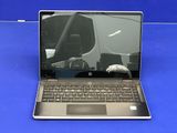 a laptop that is sitting on a blue table